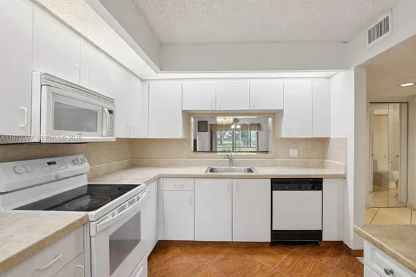 Property Slideshow image 3 of 30 | 901 sw 138th ave 108c, Pembroke Pines, FL, 33027