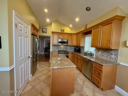 Property Slideshow image 3 of 16 | 16 caldwell ter, Marlboro, NJ, 07746