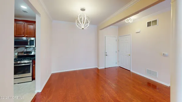 Property Slideshow image 3 of 26 | 112 regency ct 112, Morganville, NJ, 07751