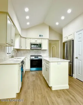 Property Slideshow image 2 of 5 | 69 caldwell ter, Marlboro, NJ, 07746