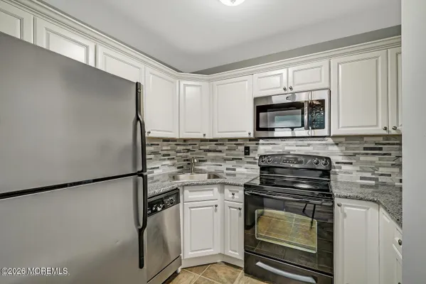 Property Slideshow image 2 of 19 | 87 arrowood rd e, Manalapan, NJ, 07726