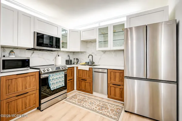 Property Slideshow image 2 of 17 | 110 amberly dr g, Manalapan, NJ, 07726