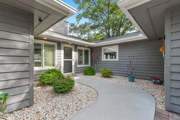 Property Slideshow image 3 of 64 | 606 camellia ln, Sunset Beach, NC, 28468