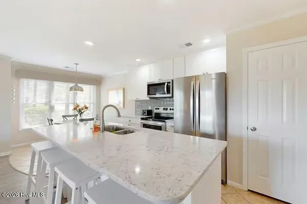 Property Slideshow image 3 of 6 | 217 clubhouse rd 2, Sunset Beach, NC, 28468