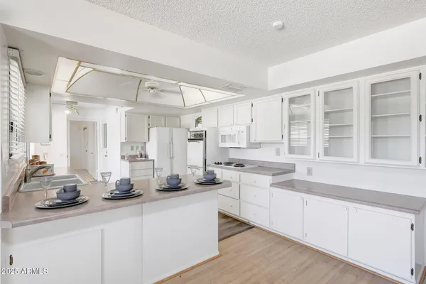 Property Slideshow image 3 of 31 | 9715 w wrangler dr, Sun City, AZ, 85373