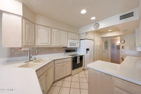 Property Slideshow image 3 of 60 | 11006 w acacia dr, Sun City, AZ, 85373