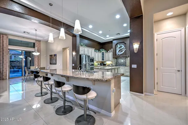 Property Slideshow image 3 of 44 | 12477 w fetlock trl, Peoria, AZ, 85383