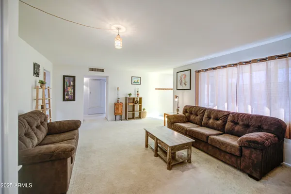 Property Slideshow image 3 of 47 | 10240 w concord ave, Sun City, AZ, 85351