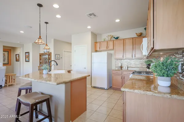 Property Slideshow image 2 of 58 | 17574 w nighthawk way, Goodyear, AZ, 85338