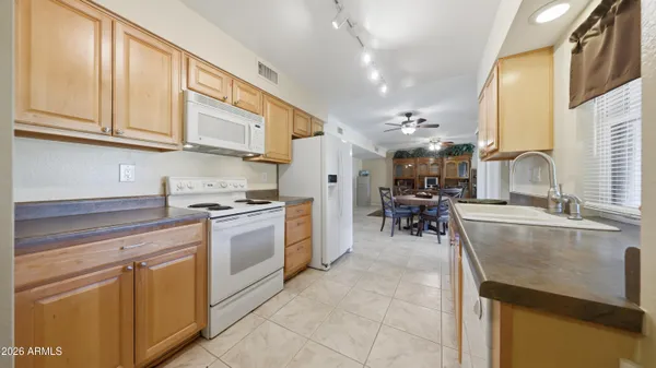 Property Slideshow image 3 of 38 | 10431 w tropicana cir, Sun City, AZ, 85351