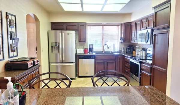 Property Slideshow image 3 of 23 | 7726 e neville ave, Mesa, AZ, 85209