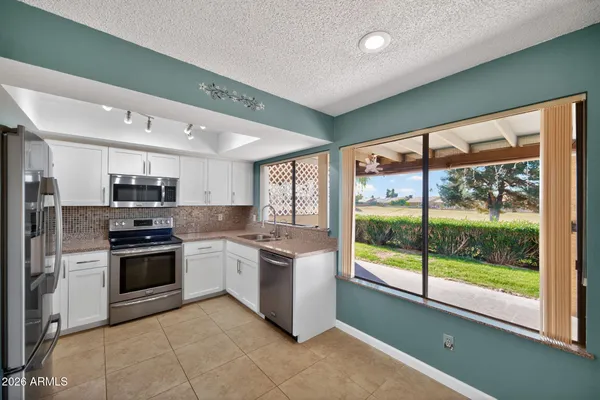 Property Slideshow image 2 of 22 | 7711 e desert flower ave, Mesa, AZ, 85208