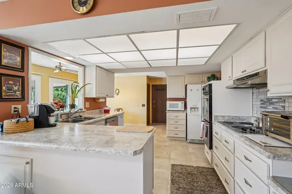 Property Slideshow image 2 of 41 | 9843 w wrangler dr, Sun City, AZ, 85373
