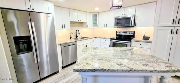Property Slideshow image 2 of 27 | 7910 e camelback rd 104, Scottsdale, AZ, 85251
