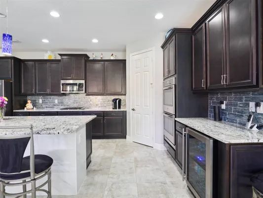 Property Slideshow image 3 of 46 | 10095 sw oak tree cir, Port St. Lucie, FL, 34987