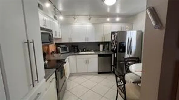 Property Slideshow image 2 of 9 | 4970 e sabal palm blvd 108, Tamarac, FL, 33319