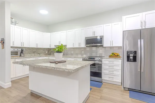 Property Slideshow image 2 of 25 | 10675 w clairmont cir # 202, Tamarac, FL, 33321