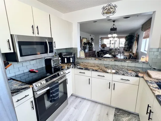 Property Slideshow image 3 of 21 | 10842 w clairmont cir # 310, Tamarac, FL, 33321