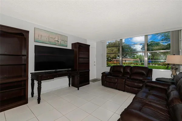 Property Slideshow image 3 of 28 | 1300 saint charles pl pembroke pnes l20, Pembroke Pines, FL, 33026