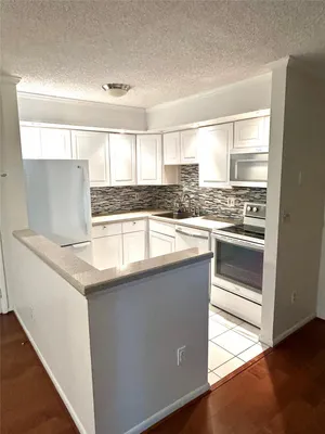 Property Slideshow image 2 of 12 | 10429 e clairmont cir # 108, Tamarac, FL, 33321