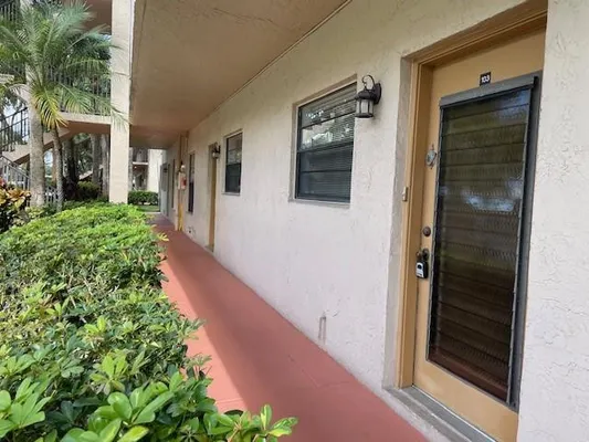 Property Slideshow image 2 of 17 | 6080 n sabal palm blvd 103, Tamarac, FL, 33319