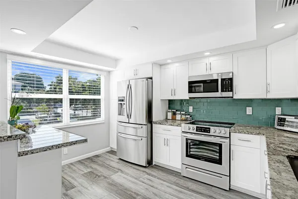 Property Slideshow image 2 of 79 | 2003 granada dr a2, Coconut Creek, FL, 33066