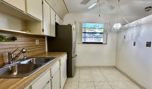 Property Slideshow image 3 of 29 | 6090 n sabal palm blvd 108, Tamarac, FL, 33319