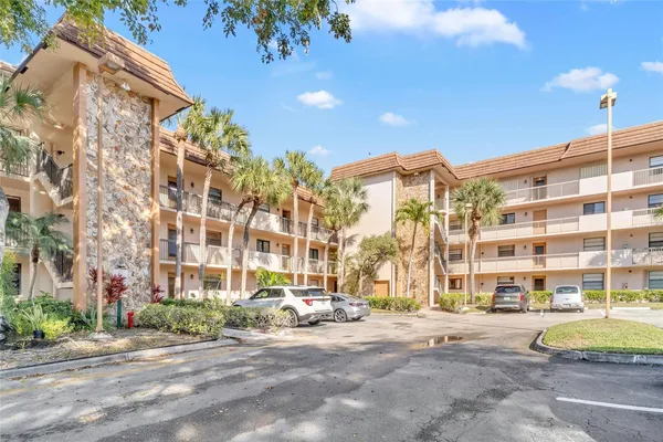 Property Slideshow image 3 of 42 | 4975 e sabal palm blvd 408, Tamarac, FL, 33319
