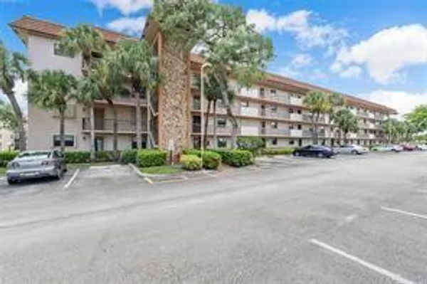 Property Slideshow image 3 of 18 | 4930 e sabal palm blvd 402, Tamarac, FL, 33319