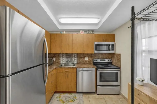 Property Slideshow image 3 of 14 | 1015 country club dr 203, Margate, FL, 33063