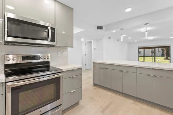 Property Slideshow image 3 of 9 | 6085 n sabal palm blvd 109, Tamarac, FL, 33319