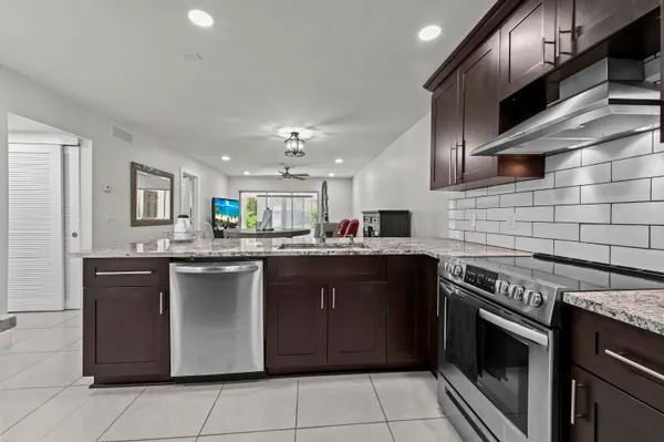 Property Slideshow image 2 of 26 | 647 marlboro oval, Greenacres, FL, 33467