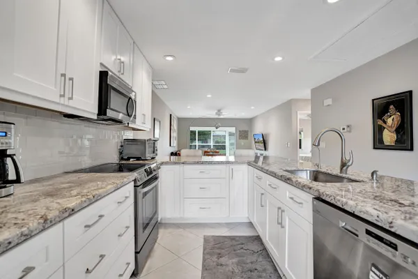 Property Slideshow image 2 of 44 | 8620 chevy chase dr, Boca Raton, FL, 33433