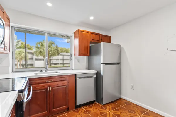 Property Slideshow image 2 of 50 | 9091 lime bay blvd 210, Tamarac, FL, 33321