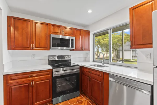Property Slideshow image 3 of 50 | 9091 lime bay blvd 210, Tamarac, FL, 33321