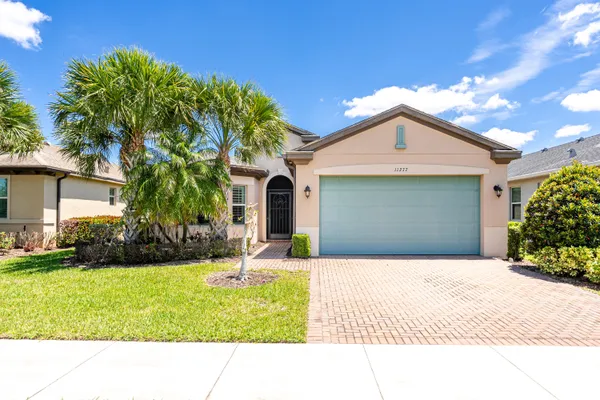 Property Slideshow image 2 of 73 | 11277 sw lake park dr, Port St. Lucie, FL, 34987