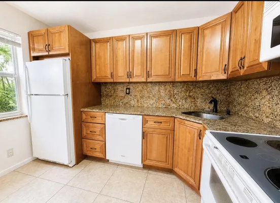 Property Slideshow image 3 of 45 | 25 colonial club dr 101, Boynton Beach, FL, 33435