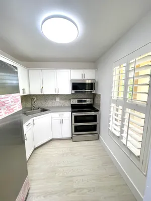 Property Slideshow image 2 of 15 | 5980 nw 64th ave 305, Tamarac, FL, 33319
