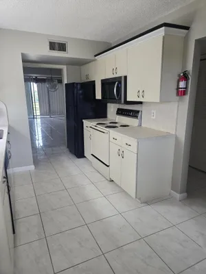 Property Slideshow image 3 of 15 | 6850 10th ave 406, Greenacres, FL, 33467