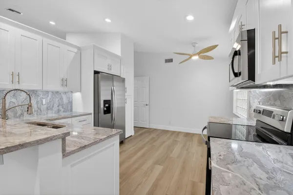 Property Slideshow image 2 of 84 | 5891 royal isles blvd, Boynton Beach, FL, 33437