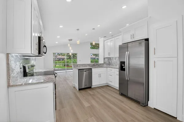 Property Slideshow image 3 of 84 | 5891 royal isles blvd, Boynton Beach, FL, 33437