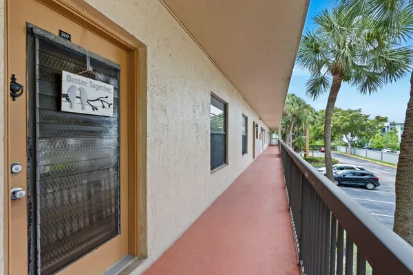 Property Slideshow image 2 of 40 | 6095 n sabal palm blvd 207, Tamarac, FL, 33319