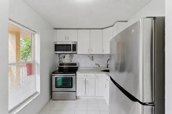 Property Slideshow image 2 of 37 | 6020 nw 64th ave 208, Tamarac, FL, 33319