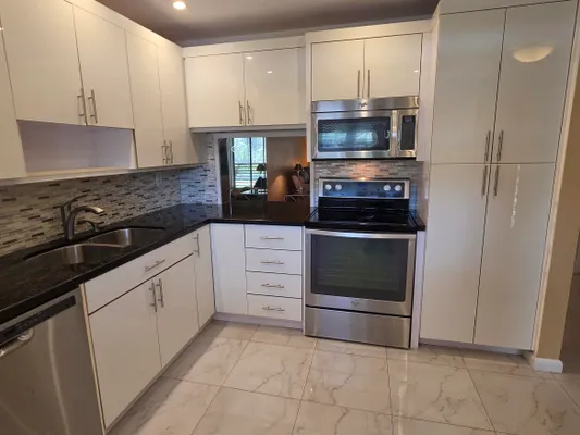 Property Slideshow image 2 of 20 | 6090 n sabal palm blvd 209, Tamarac, FL, 33319