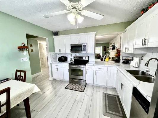 Property Slideshow image 3 of 25 | 4930 e sabal palm blvd 107, Tamarac, FL, 33319