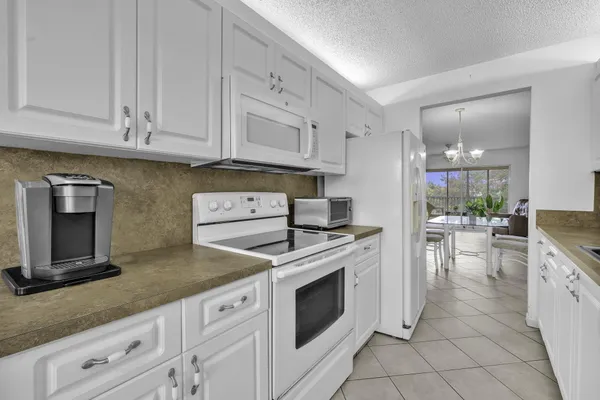 Property Slideshow image 3 of 27 | 13001 sw 15th ct 404t, Pembroke Pines, FL, 33027