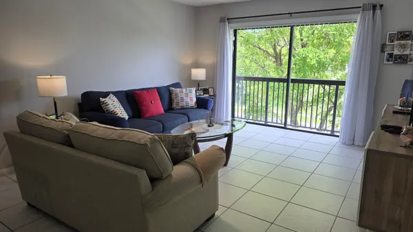 Property Slideshow image 2 of 35 | 4965 e sabal palm blvd 403, Tamarac, FL, 33319
