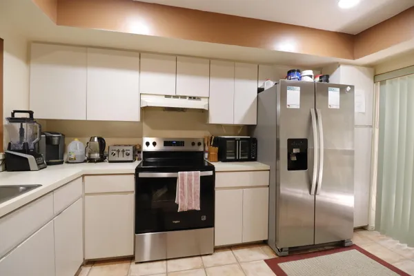 Property Slideshow image 3 of 24 | 9460 meadowood dr 202, Fort Pierce, FL, 34951