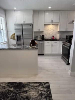 Property Slideshow image 2 of 25 | 133 lake olive dr, West Palm Beach, FL, 33411