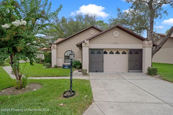 Property Slideshow image 2 of 88 | 6736 oak cluster cir, Spring Hill, FL, 34606